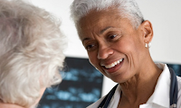 Doctor consulting patient