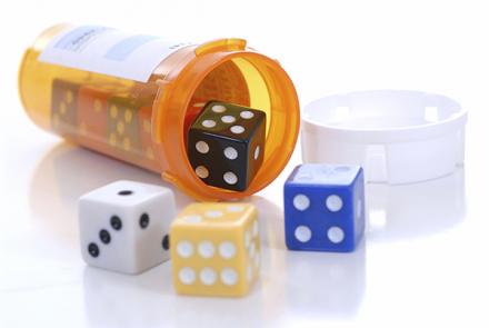 Dice in a medicine vial
