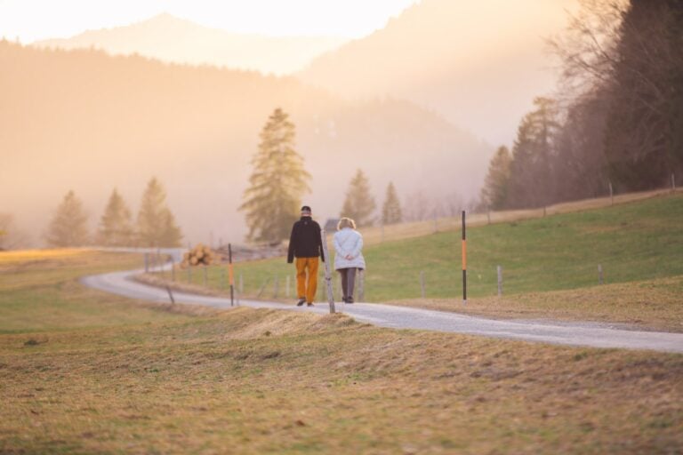 Senior couple on a long walk in the mountains