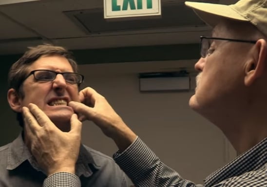 Dentist diagnosing a patient's teeth
