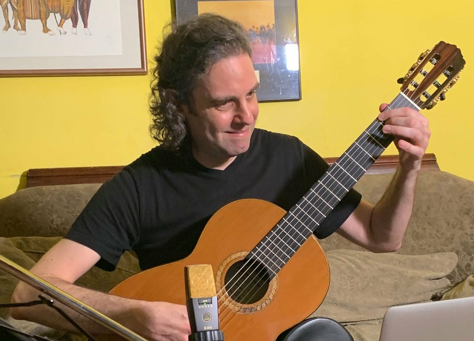 Man playing guitar for Concerts in Motion