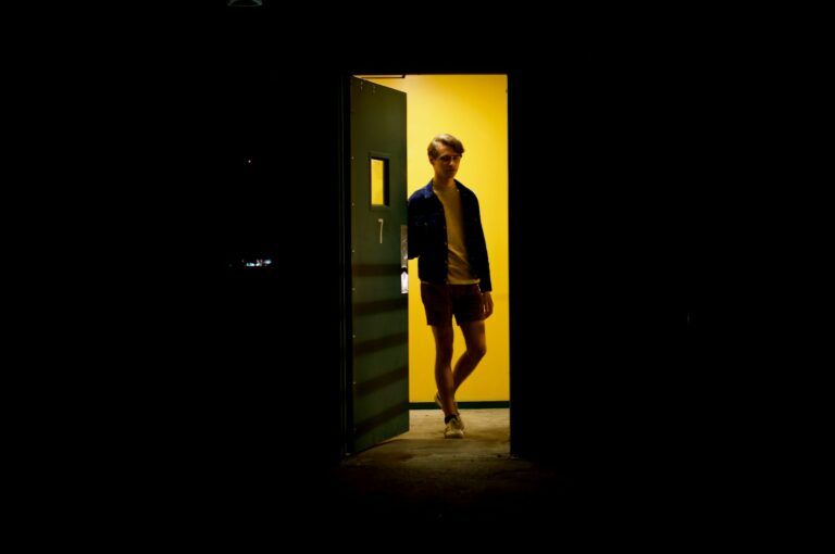 Person walking through doorway