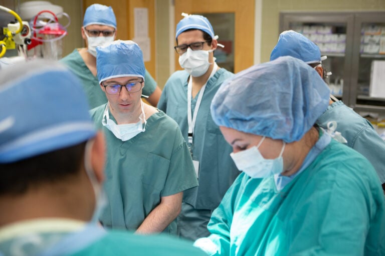 Doctors conducting hysterectomy