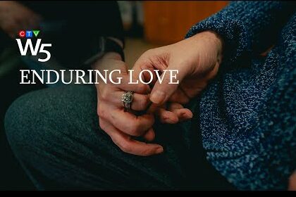 "Enduring Love" written over two hands holding each other