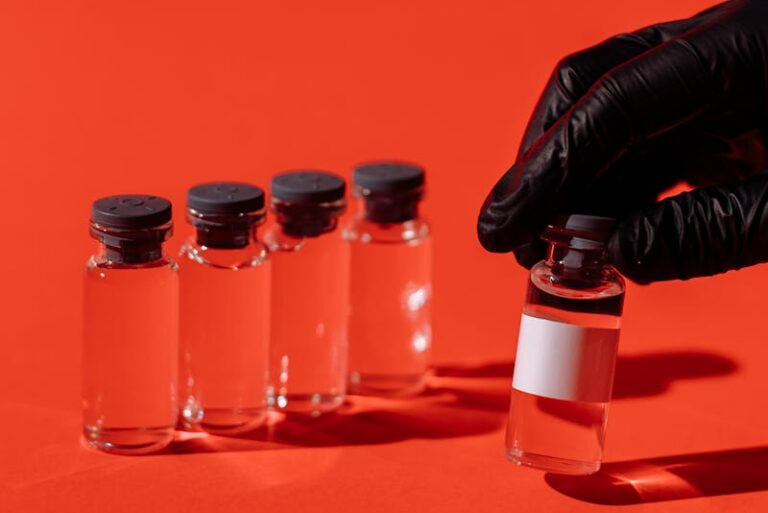 Vials On Red Surface