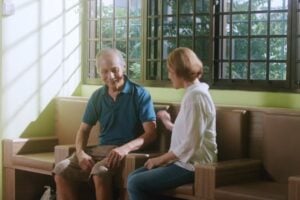 Man with dementia and his caregiver
